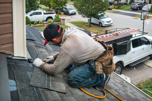 Professional Gutter Installation technician working in Clinton, NY